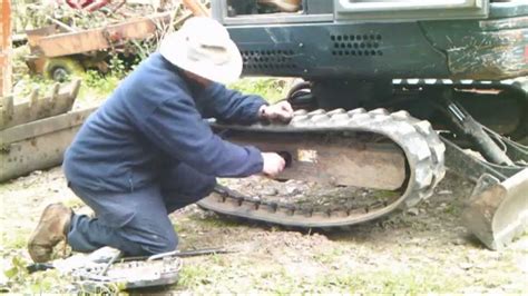 mini digger rubber track repair|repairing tracks in a mini.